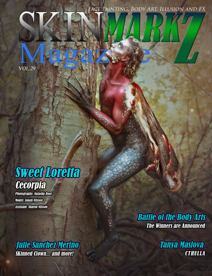 magazine cove featuring body art by sweet loretta shows long claw finger nails on moth like male model