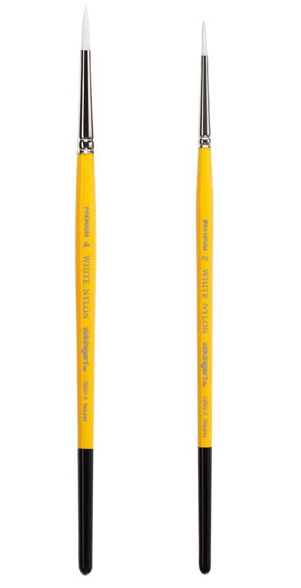 Two face painting brushes with yellow handles and white nylon bristles